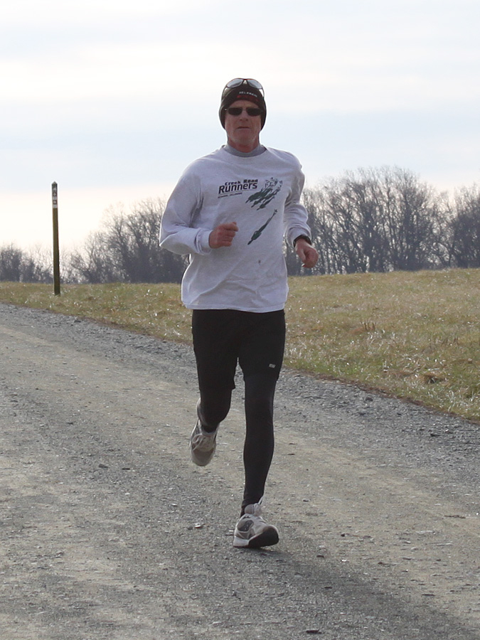 photo of Mark Deshon with poster