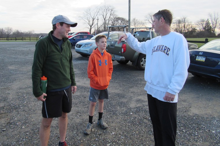 photo of Dave and Owen Edwards with Charlie Riordan
