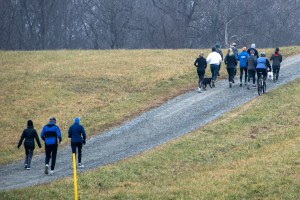 photo of runners heading uphill