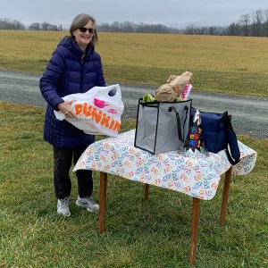 photo of Karen Rose setting up refreshments table